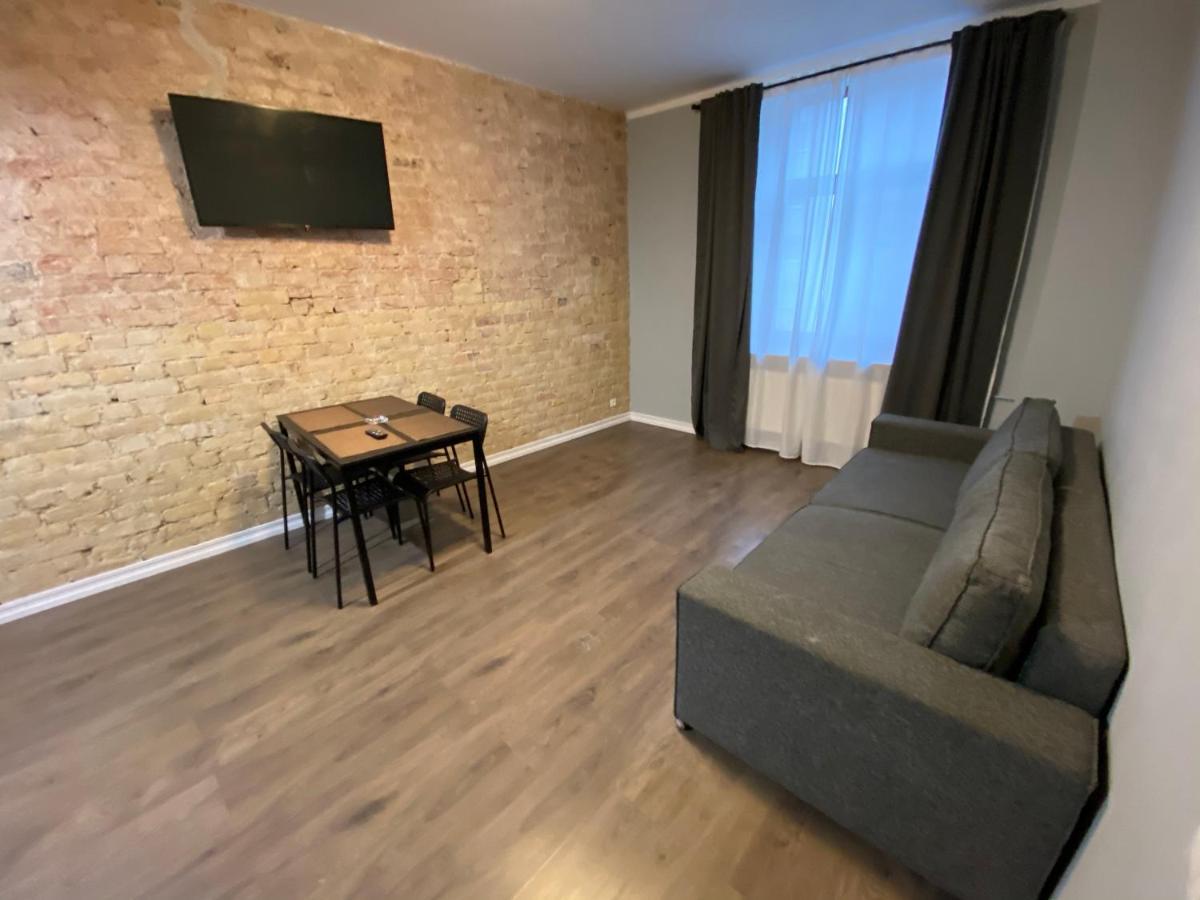 Aparthotel Рига Екстериор снимка A living room in a typical apartment