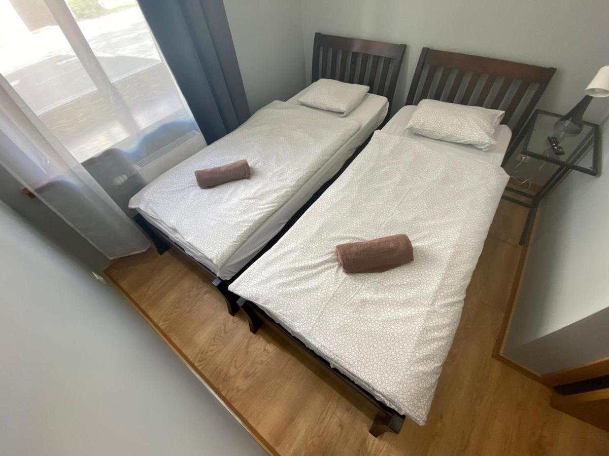 Aparthotel Рига Екстериор снимка Two single beds