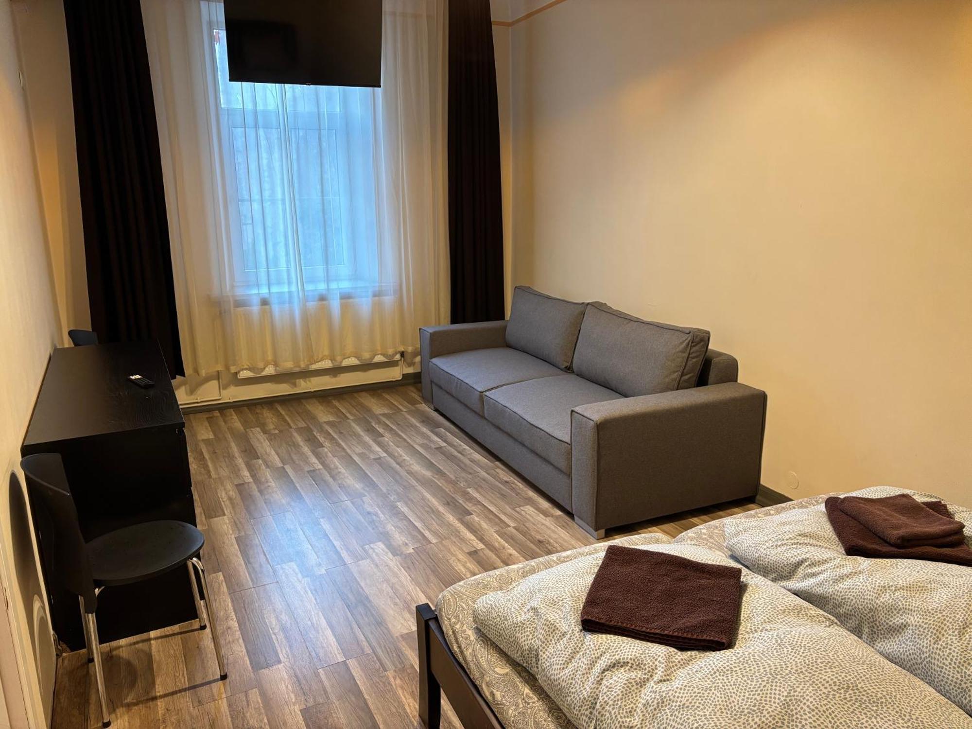 Aparthotel Рига Екстериор снимка A typical room at the hostel