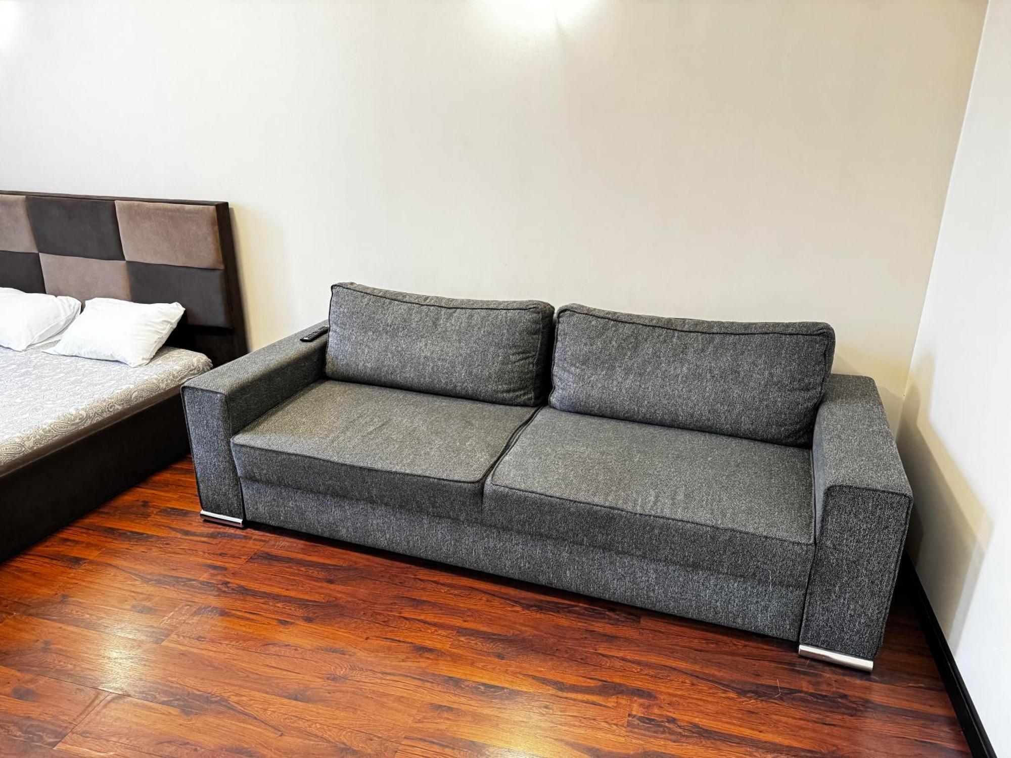 Aparthotel Рига Екстериор снимка A sofa bed